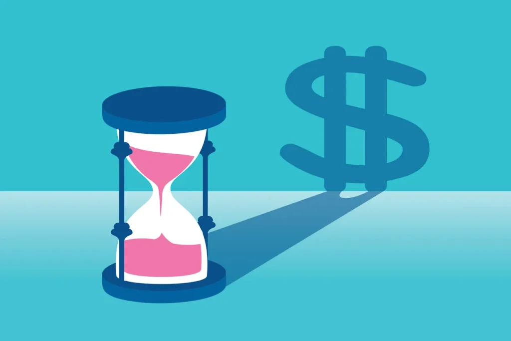 A hourglass and a dollar sign projected.